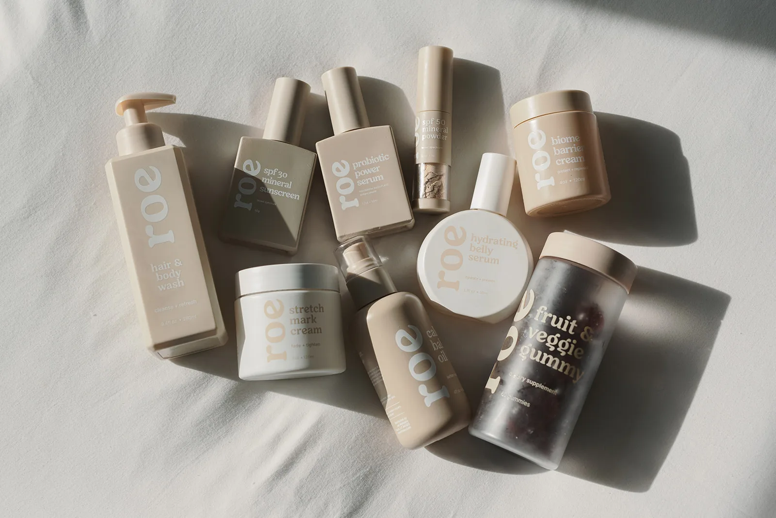 Roe Wellness skincare and supplement products arranged together